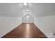 Spacious attic featuring hardwood floors, finished walls, and recessed lights at 4705 Granite Ct, Indian Trail, NC 28079