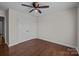 Bedroom with ceiling fan and double-door closet for ample storage at 4705 Granite Ct, Indian Trail, NC 28079
