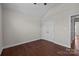 Bedroom with ceiling fan and double-door closet for ample storage at 4705 Granite Ct, Indian Trail, NC 28079