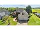 Exterior home view features a two-car garage and a well-maintained lawn and landscape at 4705 Granite Ct, Indian Trail, NC 28079