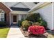 Inviting front entrance featuring manicured landscaping and flowering bushes at 4705 Granite Ct, Indian Trail, NC 28079