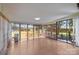 Bright sun room offering sliding glass door, bamboo shades, and hardwood floors at 4705 Granite Ct, Indian Trail, NC 28079