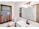 Bright bathroom features a new vanity, faucet, and decorative mirror at 4915 Huntington Farm Rd, Catawba, SC 29704
