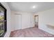 Bedroom with carpet flooring and bright walls and a view to the exterior at 4915 Huntington Farm Rd, Catawba, SC 29704