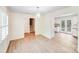Open dining area showcases wood floors and access to the kitchen and staircase at 4915 Huntington Farm Rd, Catawba, SC 29704