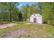 View of an outbuilding on the property with lots of surrounding trees at 4915 Huntington Farm Rd, Catawba, SC 29704