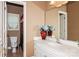Cozy bathroom with a white sink vanity, a window, and a toilet at 503 Kinsey Creek Ct, Rock Hill, SC 29730