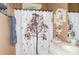 Cozy bathroom with neutral wall color and decorative shower curtain at 503 Kinsey Creek Ct, Rock Hill, SC 29730
