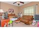 This bedroom offers a ceiling fan, love seat, and a window with natural light at 503 Kinsey Creek Ct, Rock Hill, SC 29730
