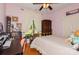 This bedroom is decorated with light pink walls and hardwood floors at 503 Kinsey Creek Ct, Rock Hill, SC 29730