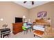 This bedroom features a ceiling fan and furnishings suitable for a or young person at 503 Kinsey Creek Ct, Rock Hill, SC 29730