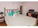 This pink bedroom is decorated with stuffed animals and a desk with a computer at 503 Kinsey Creek Ct, Rock Hill, SC 29730