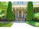 Charming front door entrance framed by lush greenery and a well-manicured landscape at 503 Kinsey Creek Ct, Rock Hill, SC 29730