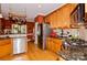 Eat-in kitchen with dark countertops, light cabinets, and stainless steel appliances at 503 Kinsey Creek Ct, Rock Hill, SC 29730