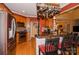 Traditional kitchen with stainless steel appliances, brick accent wall, and hanging pot rack above island at 503 Kinsey Creek Ct, Rock Hill, SC 29730