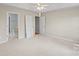 Bright and spacious bedroom featuring neutral walls and carpet at 5311 Courtfield Dr, Indian Trail, NC 28079