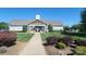 Beautiful clubhouse with manicured lawn, providing a welcoming space for community events at 5311 Courtfield Dr, Indian Trail, NC 28079