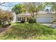 Charming single-story home with a well-maintained front lawn and attached garage at 5311 Courtfield Dr, Indian Trail, NC 28079