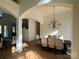 Bright dining room with wood floors, decorative chandelier and natural light with a view of outdoors at 5517 Mountain Point Ln, Charlotte, NC 28216