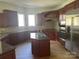 Kitchen featuring granite countertops, stainless steel appliances, and ample storage at 5517 Mountain Point Ln, Charlotte, NC 28216