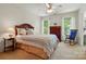 Cozy bedroom with natural light, ceiling fan, and charming decor at 6009 Glen Manor Dr, Charlotte, NC 28269