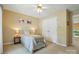 Inviting bedroom featuring natural light, neutral tones, and comfortable furnishings at 6009 Glen Manor Dr, Charlotte, NC 28269