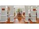 Elegant dining room with natural light, chandelier, hardwood floors, and neutral color palette at 6009 Glen Manor Dr, Charlotte, NC 28269
