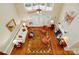 Open living room with fireplace, hardwood floors, and abundant natural light at 6009 Glen Manor Dr, Charlotte, NC 28269