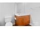 Bright bathroom with modern white countertop and cabinet with vanity at 626 N Graham St # 405, Charlotte, NC 28202