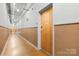 Hallway with exposed air conditioning units at 626 N Graham St # 405, Charlotte, NC 28202