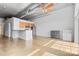 Bright living room with modern features and a stylish color palette, adjacent to a functional kitchen area at 626 N Graham St # 405, Charlotte, NC 28202