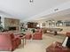This basement features carpet, natural light, a fireplace, furniture, and a pool table at 6420 Saint John Ln, Charlotte, NC 28210