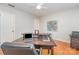 This office features an executive desk, hard wood floors, ceiling fan and neutral paint at 6634 Rocky Falls Rd, Charlotte, NC 28211