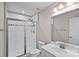 Clean bathroom featuring a glass-enclosed shower, toilet, vanity with sink, and a large mirror at 708 Brookmeade Dr, Waxhaw, NC 28173
