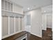 Mud room area featuring a bench with coat hooks and lots of storage at 708 Brookmeade Dr, Waxhaw, NC 28173