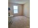Standard bedroom with neutral walls and carpet flooring at 7113 Sycamore Grove Ct, Charlotte, NC 28227