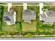 Birds eye view of property showcasing large lawn, mature trees, and neighborhood at 7362 Waterwheel Sw St # 280, Concord, NC 28025