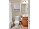 Well-maintained bathroom with a shower-tub combination, white vanity, and ample storage in the wall cabinet at 7362 Waterwheel Sw St # 280, Concord, NC 28025