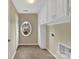 Mud room features tile flooring, a door to outside, and abundant storage space at 7362 Waterwheel Sw St # 280, Concord, NC 28025