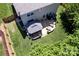 Aerial view of the backyard featuring a stone patio with a gazebo and a well-maintained lawn at 739 Ivy Trail Way, Fort Mill, SC 29715