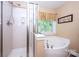 Modern bathroom with a separate shower and soaking tub, offering a bright and relaxing space at 739 Ivy Trail Way, Fort Mill, SC 29715