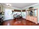 Inviting foyer with hardwood floors, decorative doorway, and an elegant display cabinet at 739 Ivy Trail Way, Fort Mill, SC 29715