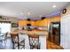 Bright kitchen featuring granite counters, stainless steel appliances, and a breakfast bar at 739 Ivy Trail Way, Fort Mill, SC 29715