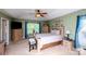 Spacious main bedroom with light wood furnishings, a tray ceiling, and plenty of natural light at 739 Ivy Trail Way, Fort Mill, SC 29715