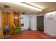 Unfinished basement with secure vault door, access stairs, and concrete floors offers renovation possibilities at 821 Mark St, Belmont, NC 28012