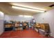 Unfinished basement offering ample storage space with boxes and shelving at 821 Mark St, Belmont, NC 28012