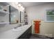 Bathroom features double sinks, lots of counter space, and an updated vanity at 821 Mark St, Belmont, NC 28012