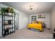 Bedroom with neutral walls, closet space, and light from a window at 821 Mark St, Belmont, NC 28012