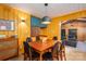 Eat meals together in this stylish dining room with views into the living room at 821 Mark St, Belmont, NC 28012