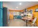Bright kitchen features custom tile backsplash, breakfast bar, and stainless steel appliances at 821 Mark St, Belmont, NC 28012